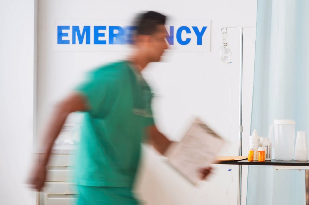 SURGEON ENTERING EMERGENCY ROOM