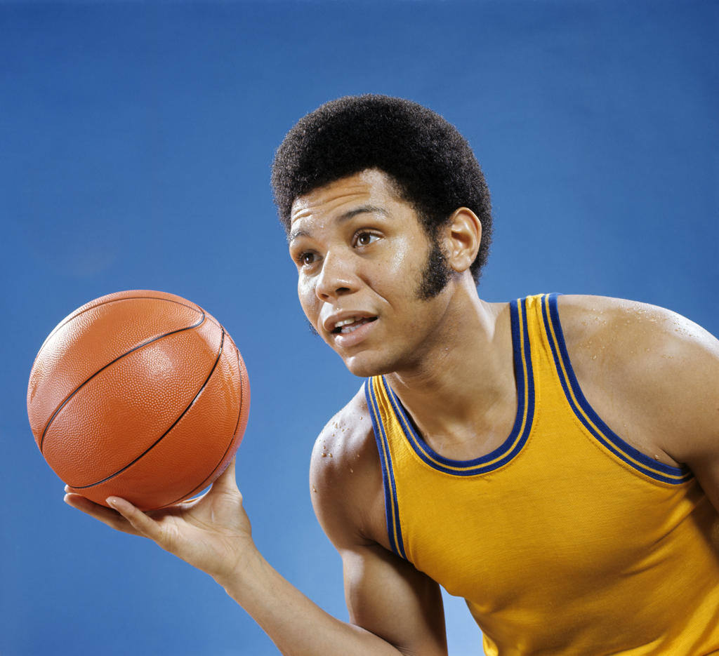 1960s 1970s AFRICAN AMERICAN MAN HOLDING BASKETBALL