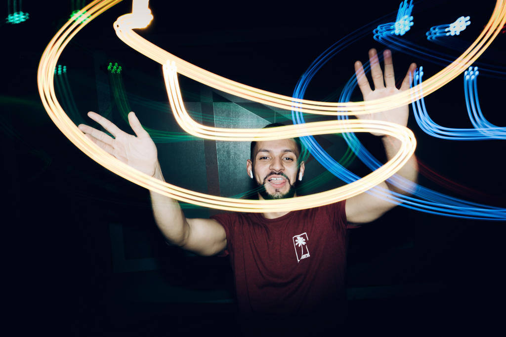 HANDSOME BEARDED MAN DANCING IN SPOTLIGHT