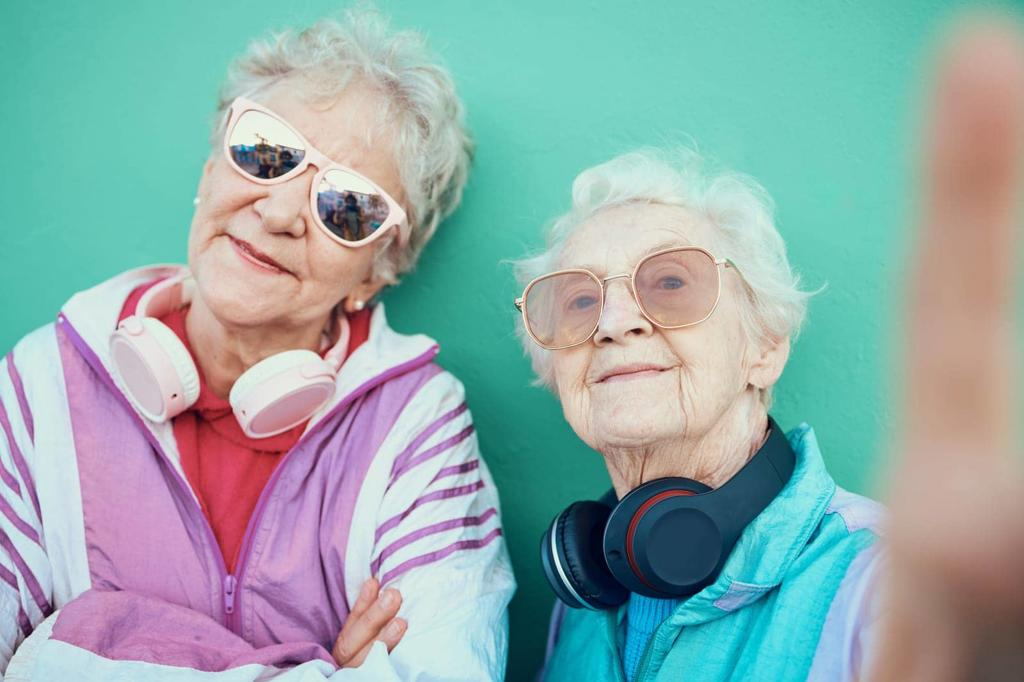 SENIOR WOMEN, FASHION AND RETRO SELFIE WITH SUNGLASSES, HEADPHONES AND VINTAGE CLOTHES WITH COOL MINDSET OUTDOOR